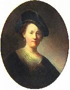 Bust of a woman with a feathered beret Rembrandt